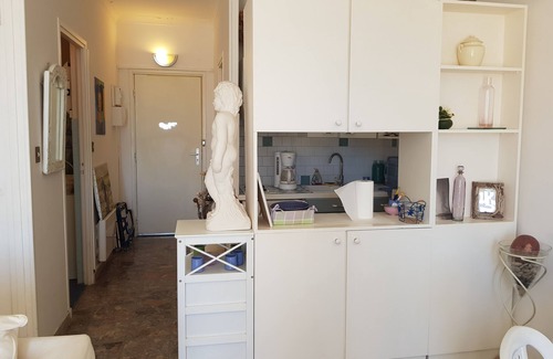 Le Ricanto Apartment | Large bright studio with terrace on the beach with sea and city view