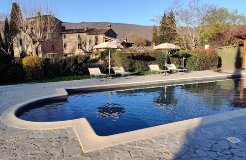 Cortona Apartment | Large country apartment in Cortona 1bed1bath with shared pool & gorgeous gardens