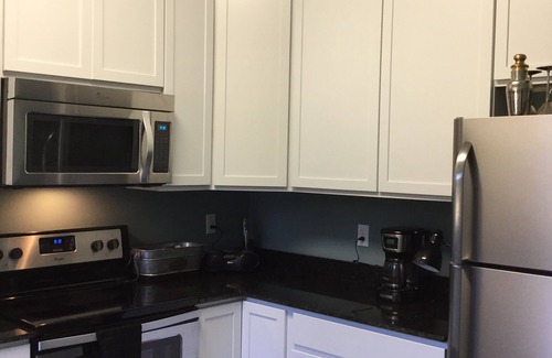 Bay St Louis Cottage | “LARGE DOG” friendly, charming historic cottage with pool, and rock garden.