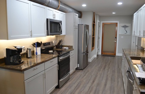 Sunbury House | Large home w/3 separate kitchens & living spaces