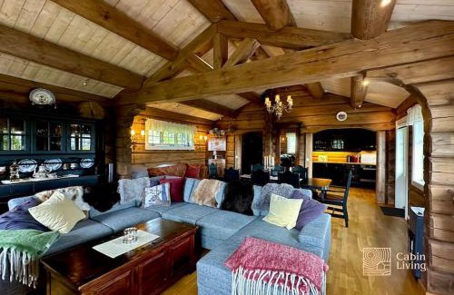 Ringsaker House | Large log cabin at Sjusjøen with sauna, fireplace and panoramic view