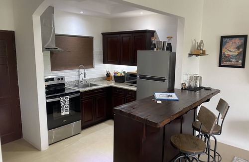 IronShore Estates Apartment | Large Modern Studio with Balcony Mountian & Ocean View