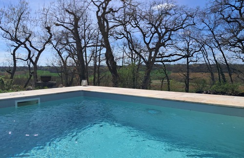 Sarrant House | Large stone gîte for 12 people, swimming pool and boules pitch.