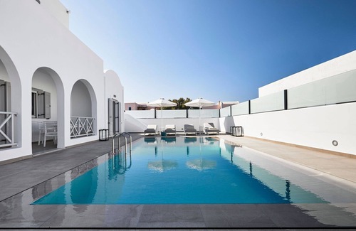 Monolithos Villa | Lavish Santorini Villa | Aegean Serenity Villa | 3 Bedrooms | Private Heated Pool | Lovely Furnished Terrace | Shaded Outdoor Dining Area | Prime Location | Monolithos