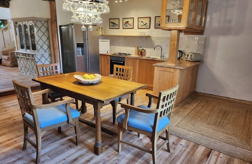 Celles Cottage | Le Grenier, a charming gîte on the side of a hill. Stunning views, stunning pool