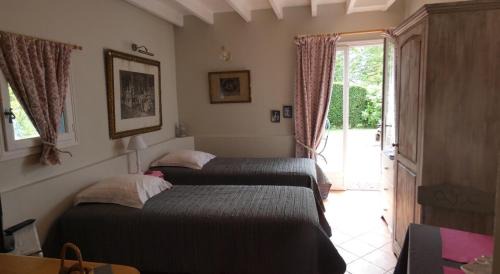 Sainte-Marguerite-de-Viette Bed & Breakfast | Les Petits Matins Bleus - Chambres d'hôtes "Les Pommiers"