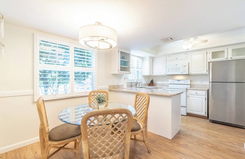 Moorings Condo | Less than 2 miles to the beach! West of 41 condo with pool and hot tub!