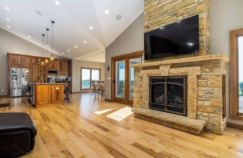 Mineral Point House | Less than one mile from the ATV Trail with a hot tub on deck to end your day!