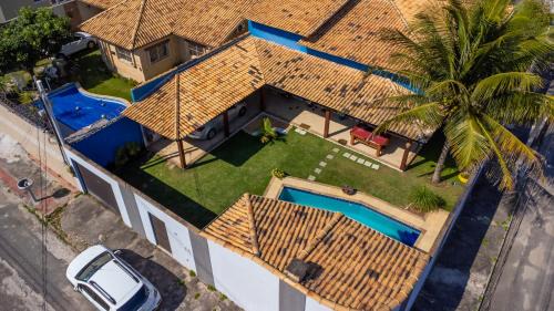 Interlagos House | Linda casa com ar e piscina em Interlagos Vila Velha ES