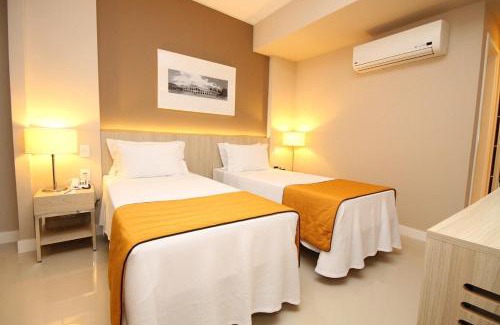 Barra da Tijuca Apartment | Linda suíte de hotel, acomoda até 3 pessoas Milly