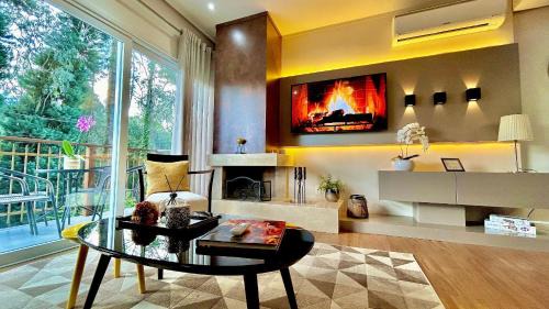 Carniel Apartment | Lindo e aconchegante com lareira cond c/piscina