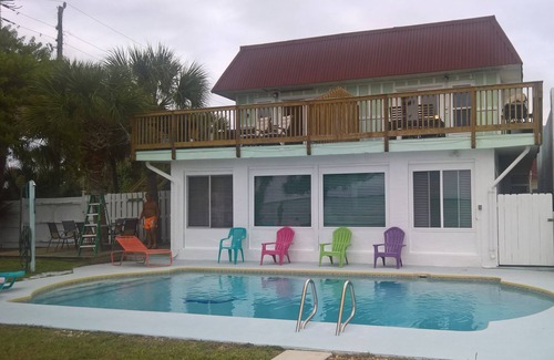 Crescent Beach Apartment | Live like in Paradise directly on the Banana River with Pool 150m to the Beach
