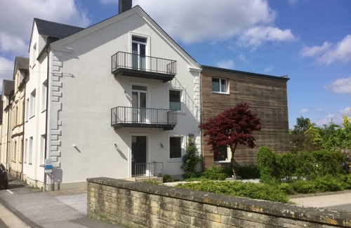 Brilon Apartment | Living in a renovated 1907 town house with garden and pool