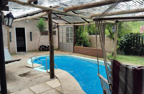 Neptunia House | Lo de Acosta , Piscina Climatizada