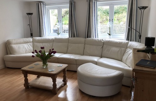 Porthtowan House | Located 60m from beach and situated opposite the sand dunes. Loved by families.