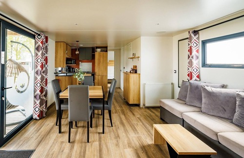 Maurik Ski Chalet | Lodge in Netherlands with Pool & Veranda