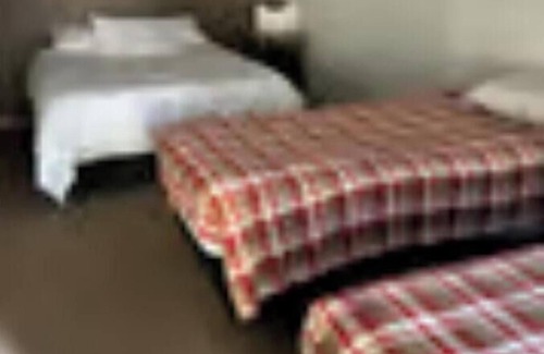 Tulelake RV Rental | Lodging 5, 2 twins, stove-top kitchen with necessities and hot water.