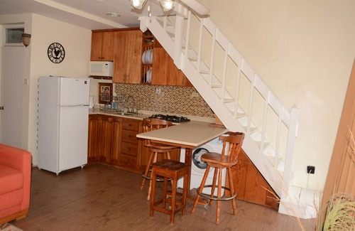 St.Bran's Burg Condo | Loft Apartment W/ Modern Amenities, Pool, Natural Beach Access, And Pool Bar