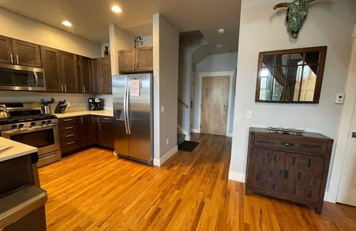 Salida Condo | Lofted condo on the boat ramp, downtown Salida, king bed plus super comfortable queen murphy bed and sleeper sofa. Two levels, two bathrooms, parking spot in garage included.