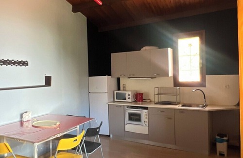 Argos House | Lofty cool apartment with a great view of the garden from above