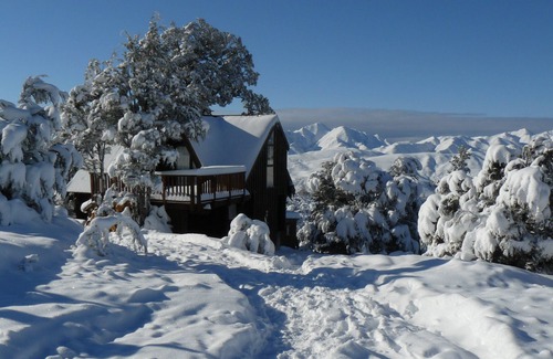 Mt Lyford Cabin | Log cabin in the mountains with indoor climbing wall, perfect for a family.