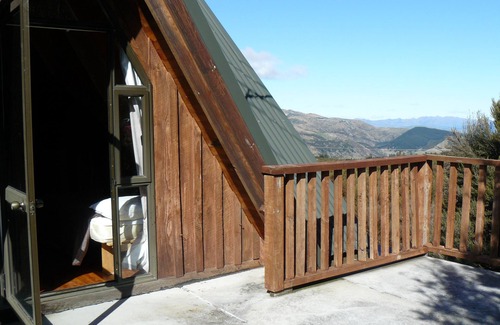 Mt Lyford Cabin | Log cabin in the mountains with indoor climbing wall, perfect for a family.