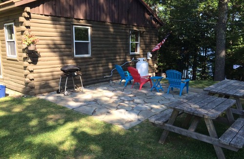 Liberty Cabin | Log cabin on Lake St George! Family adventures await. Openings in September!