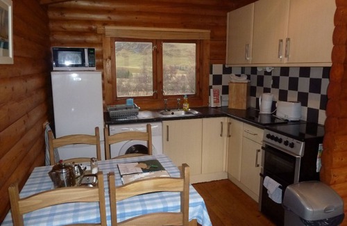 Spittal of Glenshee Cabin | Log Cabin with Hot Tub | Sleeps 4 | In the Cairngorm National Park | Accepts Dogs