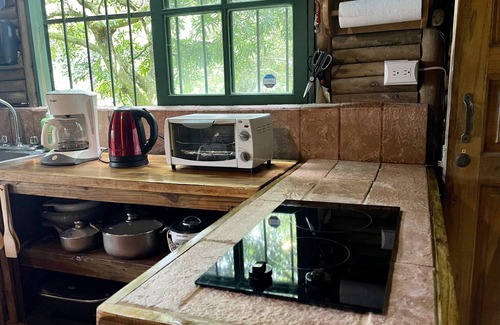 Desamparaditos Cabin | Log cabin. Wooden soul dressed in jungle pet friendly