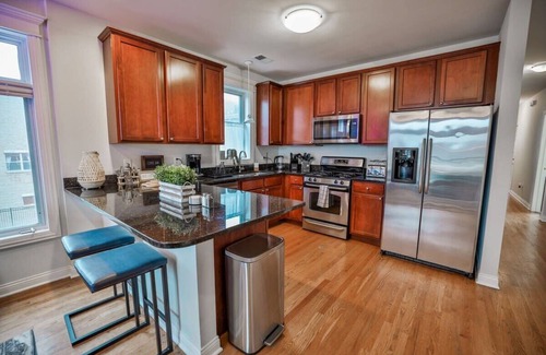 Near West Side Condo | Long-Term Stays | 1 Garage Parking | Private Balcony