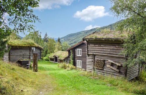 Nord-Fron House | Look forward to a fulfilling vacation in this Norwegian cottage overlooking the valley.