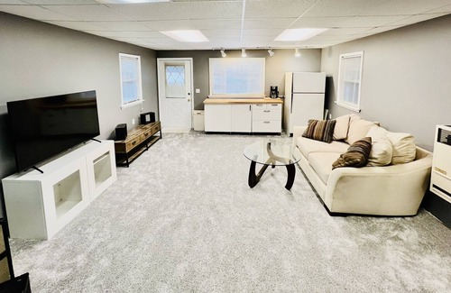 West Branch Cottage | Loon Lookout has its own beach and is on a private lake in West Branch, MI