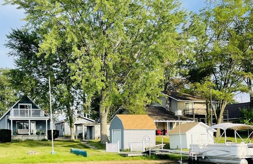 West Branch Cottage | Loon Lookout has its own beach and is on a private lake in West Branch, MI