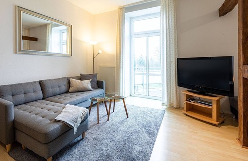 Muritz Apartment | Lord of the castle - Lord of the castle with 2 balconies in the manor house Carolinhof -