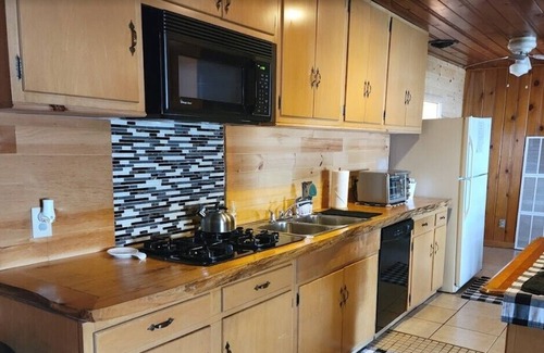 Hawks Cabin | Lost Lake Getaway (Hawks, MI): Lakefront fun for the entire family! 20 minutes from Rogers City!