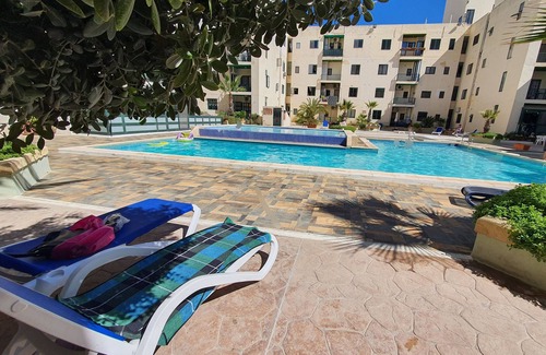 Bugibba Apartment | Lovely 2 bedroom apartment with communal pool - 2 minutes from beach