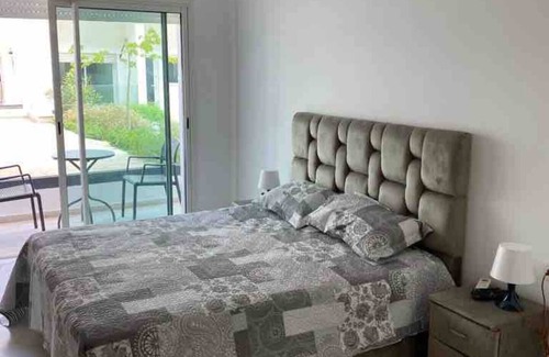 Harhoura Condo | Lovely 4-bedroom condo with pool