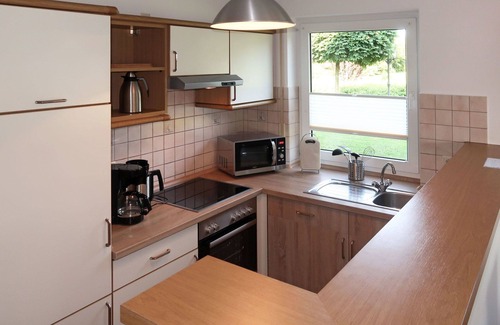 Ditzumerverlaat House | Lovely apartment in villa for 8 guests with WIFI, TV, terrace and pets allowed
