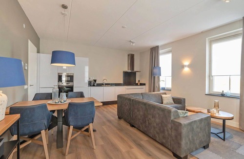 Colijnsplaat Apartment | Lovely apartment for 4 guests with hot tub, WIFI, TV and balcony