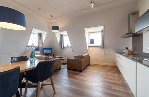 Colijnsplaat Apartment | Lovely apartment for 4 people with WIFI, hot tub, TV and balcony