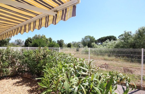Portiragnes-Plage House | Lovely Corner house with wintergarden, 2 bedrooms, WIFI, 4 people, in a secured residence LE CLOS.