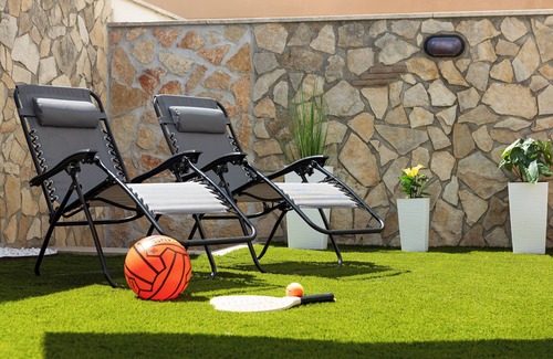 Fiumicino Apartment | Lovely seafront apartment with large garden, 10 min from Fiumicino Airport