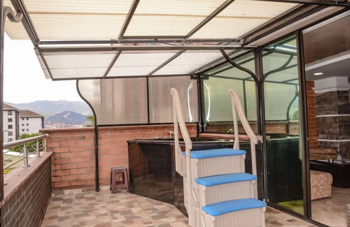 Astorga Apartment | Lower Penthouse Two Bedroom AC DECK with Hot Tub Elevator AC