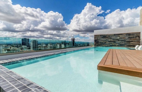 Downtown Santo Domingo Apartment | Lujoso Apartamento 5 Star ROOFTOP POOL & GYM 1BE -1 1/2 Ba