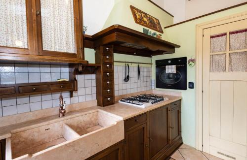 Intra Apartment | Luminosa Mansarda nel Cuore di Intra