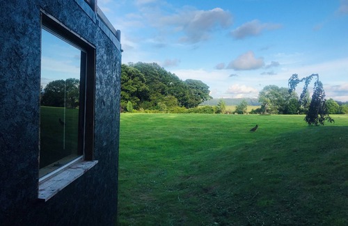 Guisborough House | Luna Lodge, nestled in field and woodland surroundings