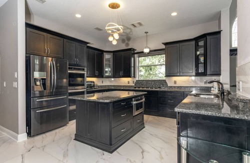 Ormond Beach House | Lux 4 BR Home w/Integrated Pool & Heated Spa