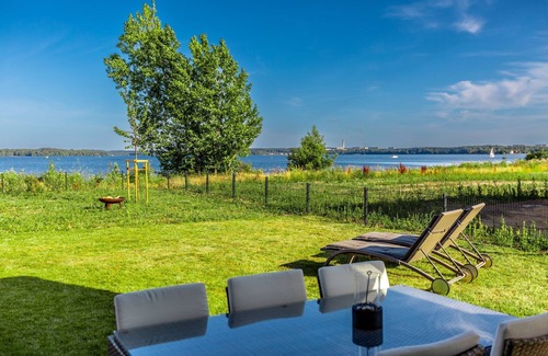 Schwerin Apartment | Luxoriöse Ferienwohung in Erster Reihe am Schweriner See mit Kamin
