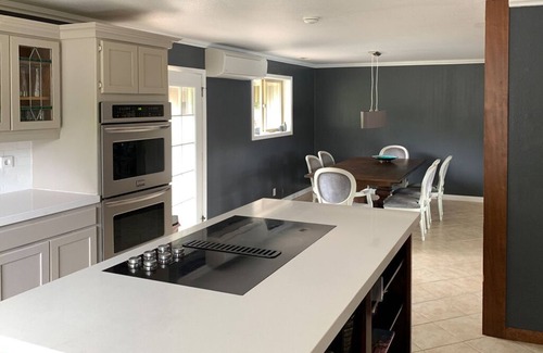 Langlois House | Luxurious Getaway on the Lake with hot tub, pool table, boat dock, covered porch