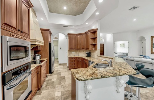 Bay Isle House | Luxurious Paradise with Tiki Bar and Heated Pool, Just Remodeled!